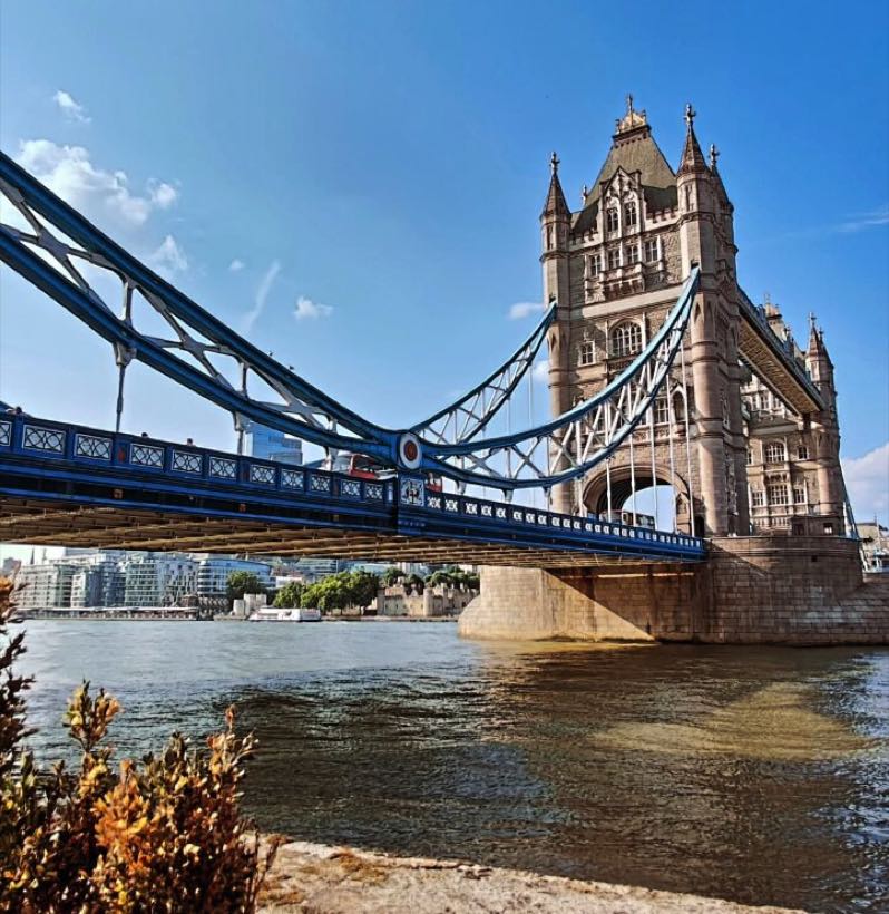 The Tower of London with Tower Bridge behind it