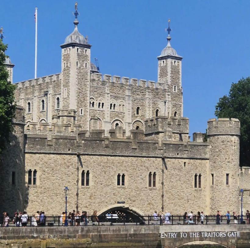 The Tower of London seen across the dry moat from Tower Hill